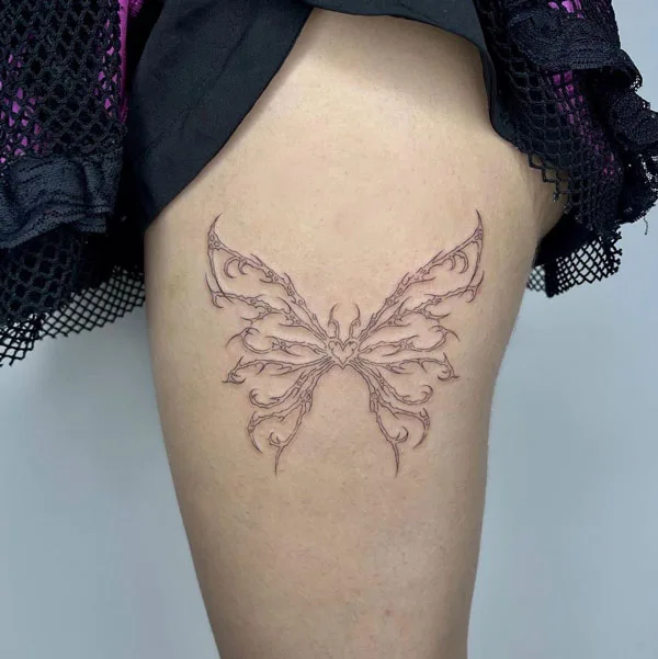 Butterfly thigh tattoo 57