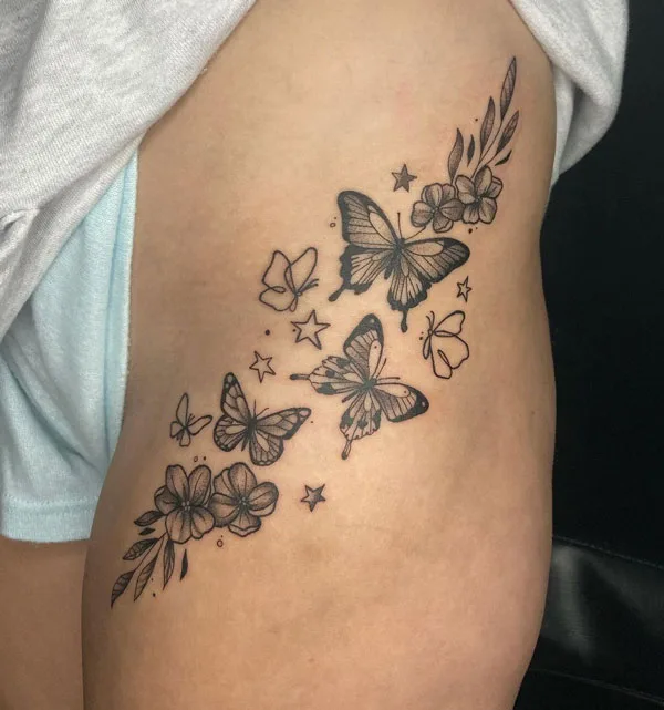 Butterfly thigh tattoo 63
