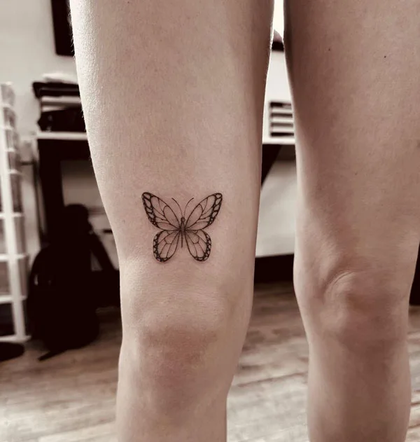 Butterfly thigh tattoo 64