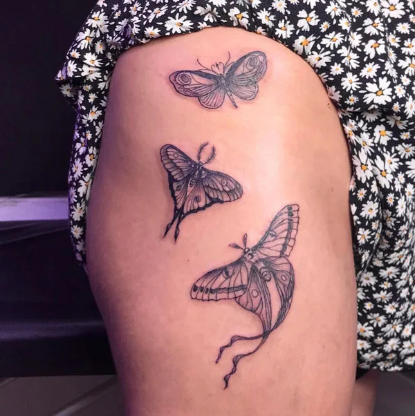 Butterfly thigh tattoo 66