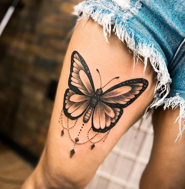 Butterfly thigh tattoo 68