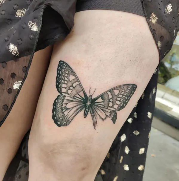 Butterfly thigh tattoo 74