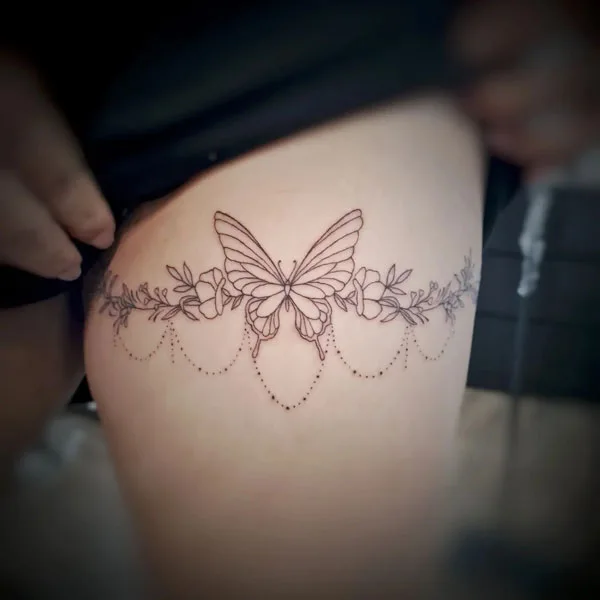 Butterfly thigh tattoo 87