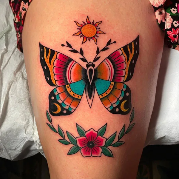 Traditional butterfly thigh tattoo