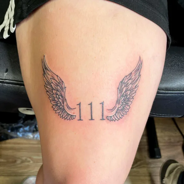 111 angel number tattoo