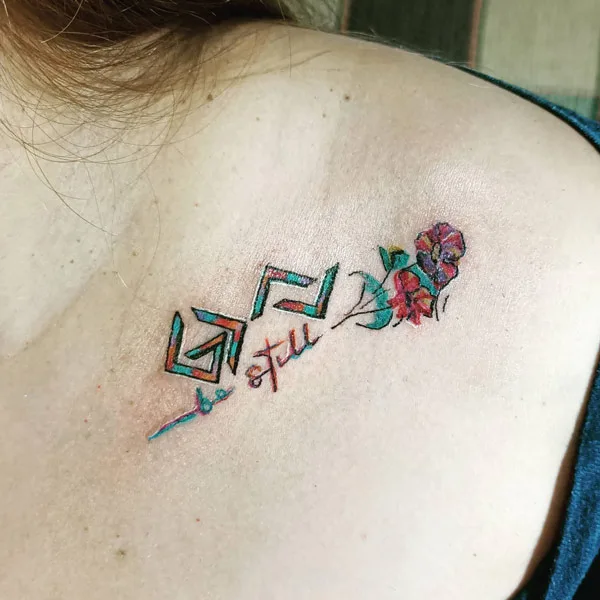 Be still flower tattoo