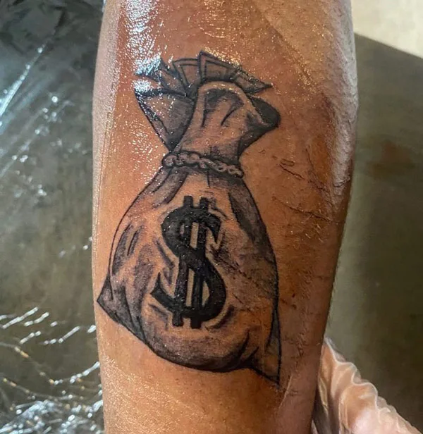 Money bag tattoo 36