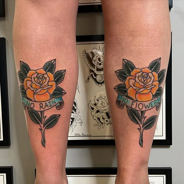 No rain no flowers leg tattoo
