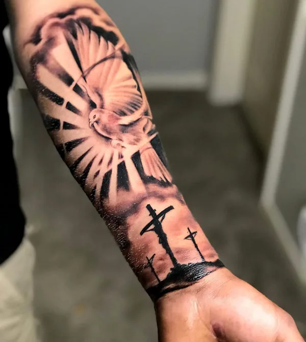 Sun with rays forearm tattoo