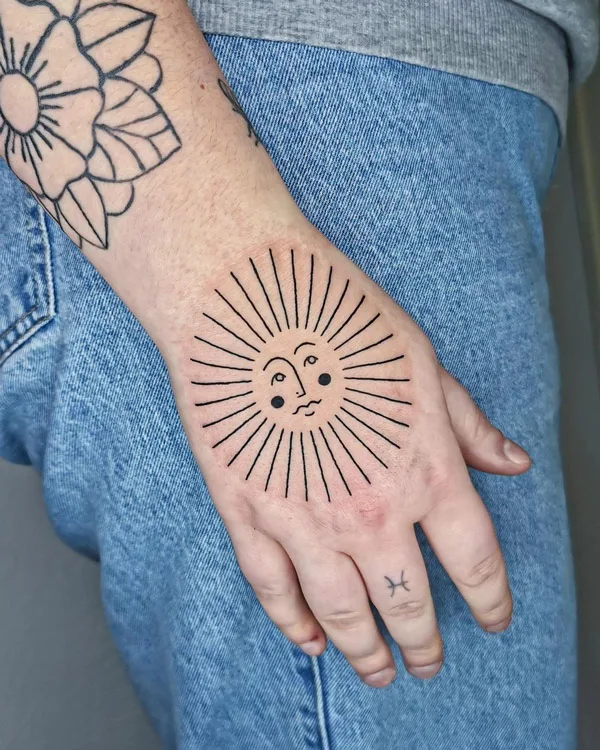 Sun with rays tattoo 33