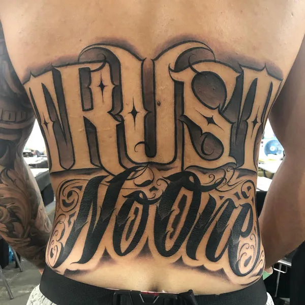 Trust no one tattoo 17