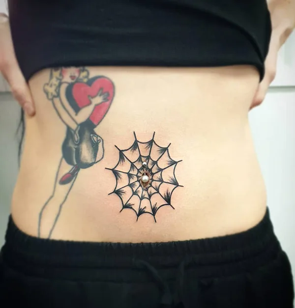 Belly button tattoo 11