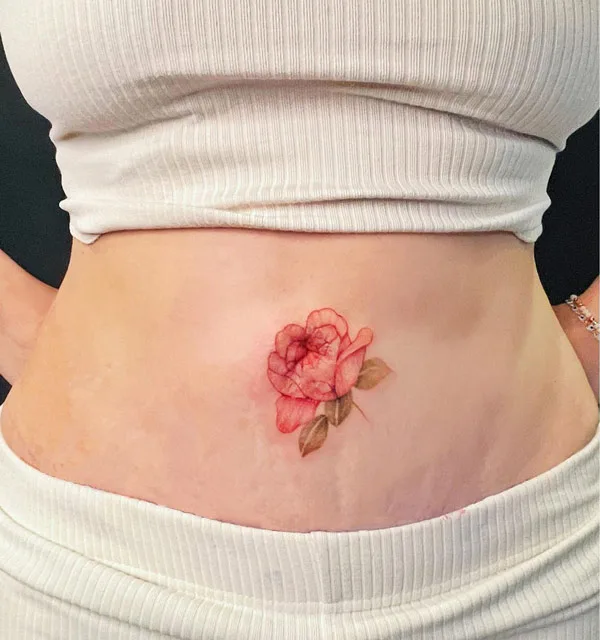 Hey everyone! As you can see my tattoo does not line up with my belly button.  Is there anything that can be done to it that will fix it? : r/tattoo