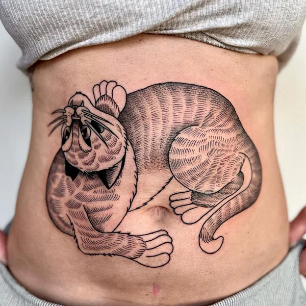 Cat belly button tattoo