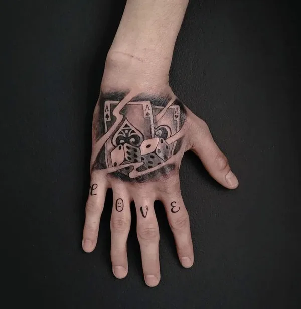 Dice tattoo on hand