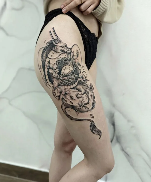 Dragon tattoo on thigh 12