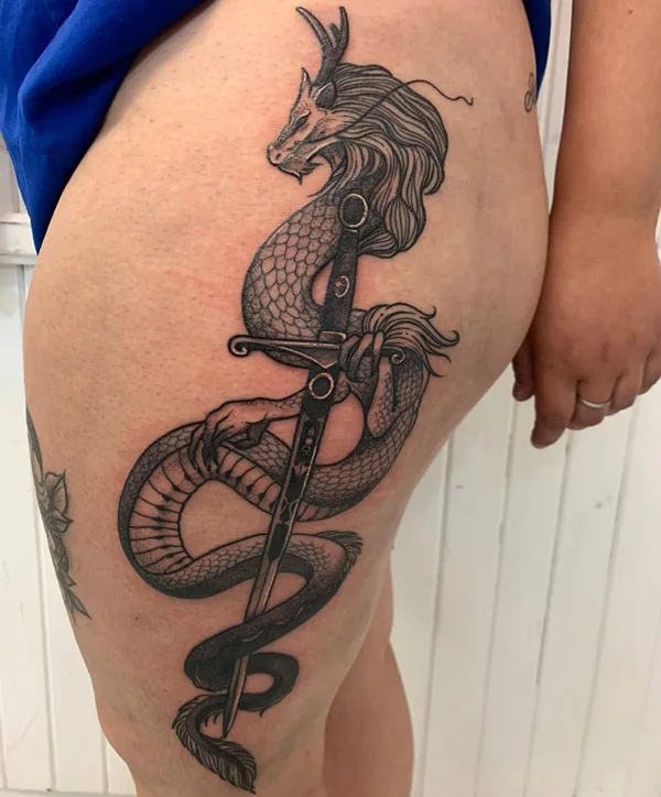 Dragon tattoo on thigh 13