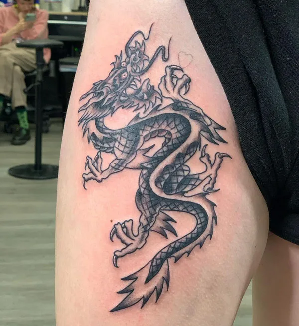 Dragon tattoo on thigh 15