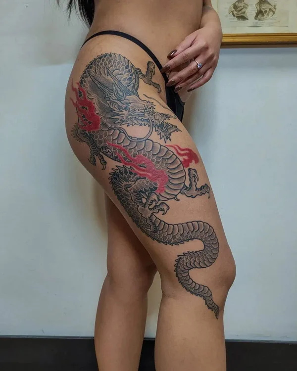 Dragon tattoo on thigh 23