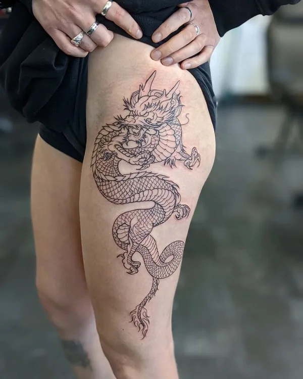 Dragon tattoo on thigh 36