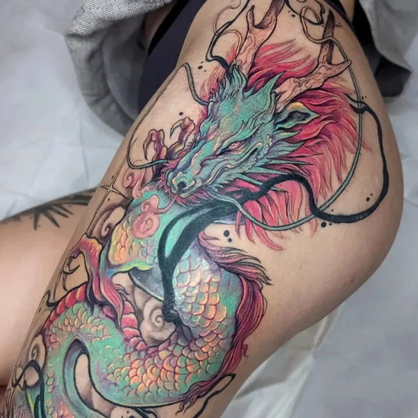 Dragon tattoo on thigh 4