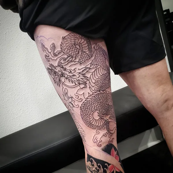 Dragon tattoo on thigh 44