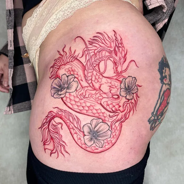 Dragon tattoo on thigh 5