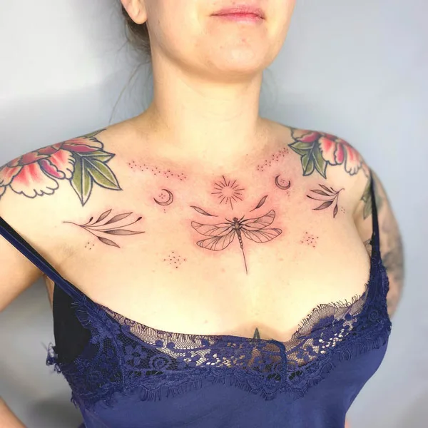 Dragonfly tattoo on chest