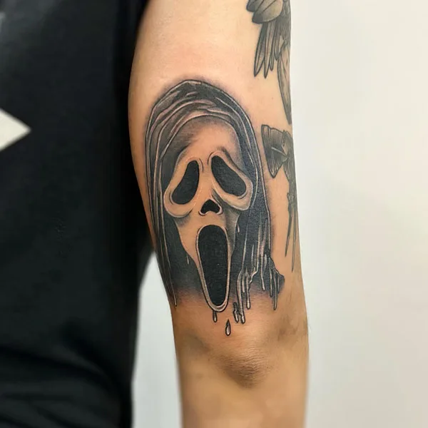 Ghostface arm tattoo