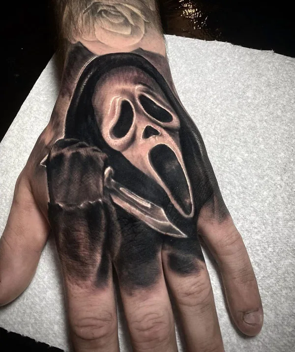Ghostface tattoo on hand
