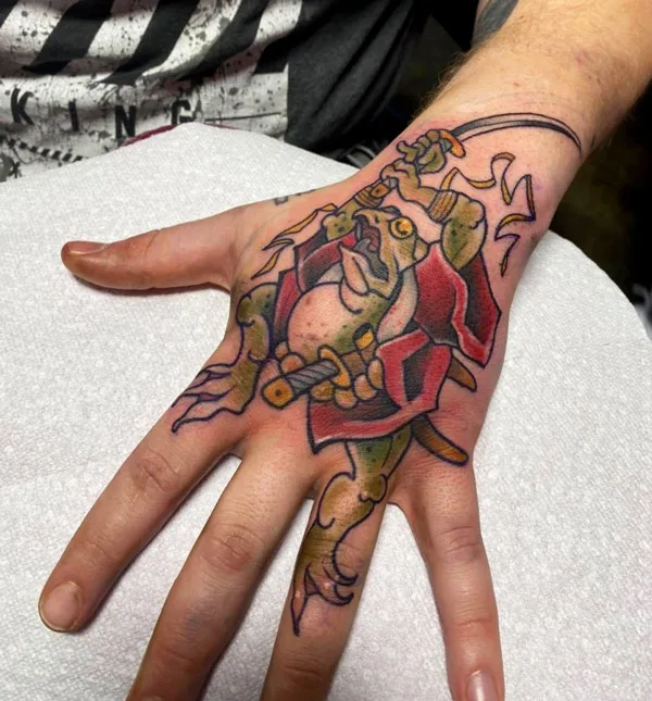 Japanese frog tattoo on hand