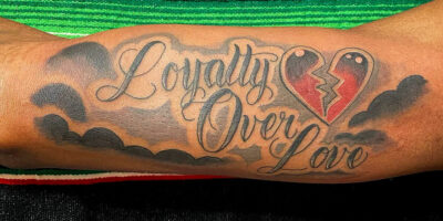 Loyalty over love tattoo