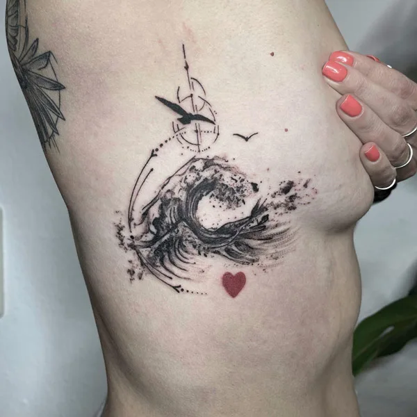 Ocean wave tattoo 16