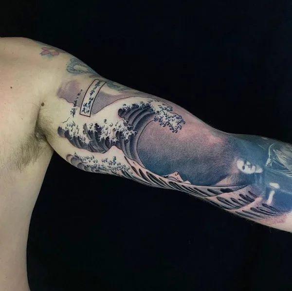 Ocean wave tattoo 8