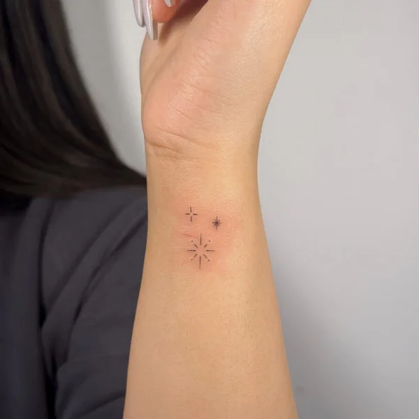 Small sparkle tattoo