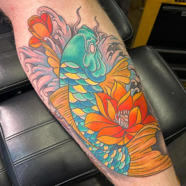 Water lily and koi fish tattoo