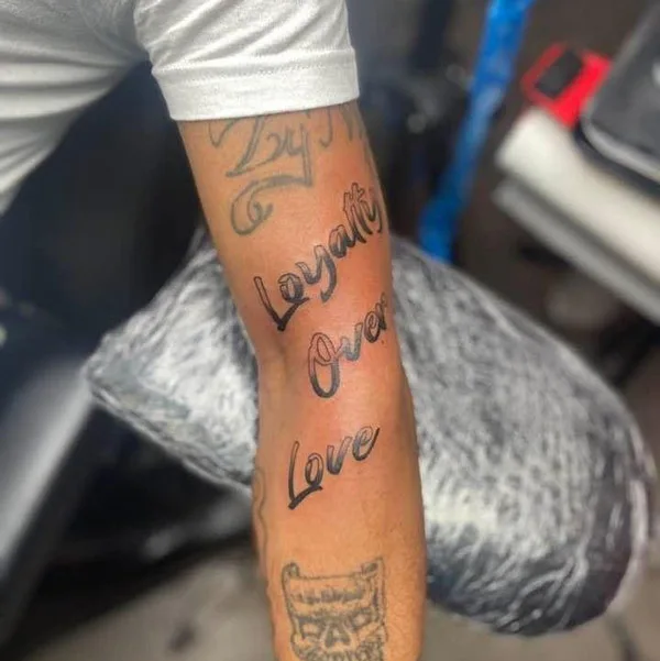 loyalty over love tattoo 23