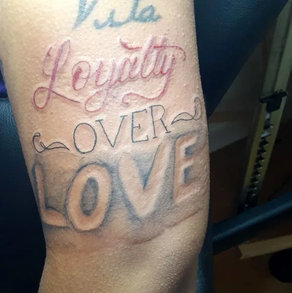loyalty over love tattoo 29