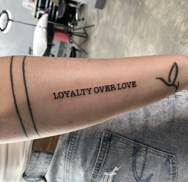 loyalty over love tattoo 30