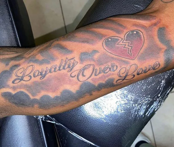 loyalty over love tattoo 34