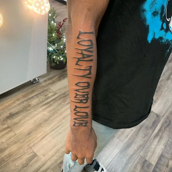 loyalty over love tattoo 7