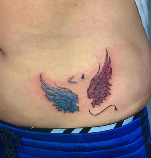 Angel and demon wings tattoo