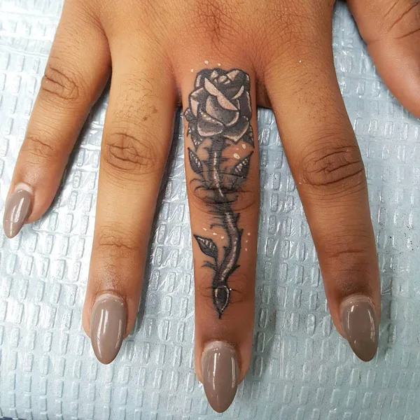 Black Rose Finger Tattoo