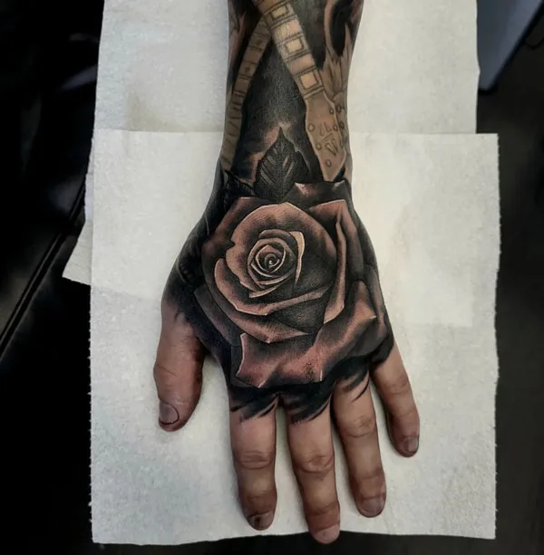 Black Rose Tattoo on Hand 2