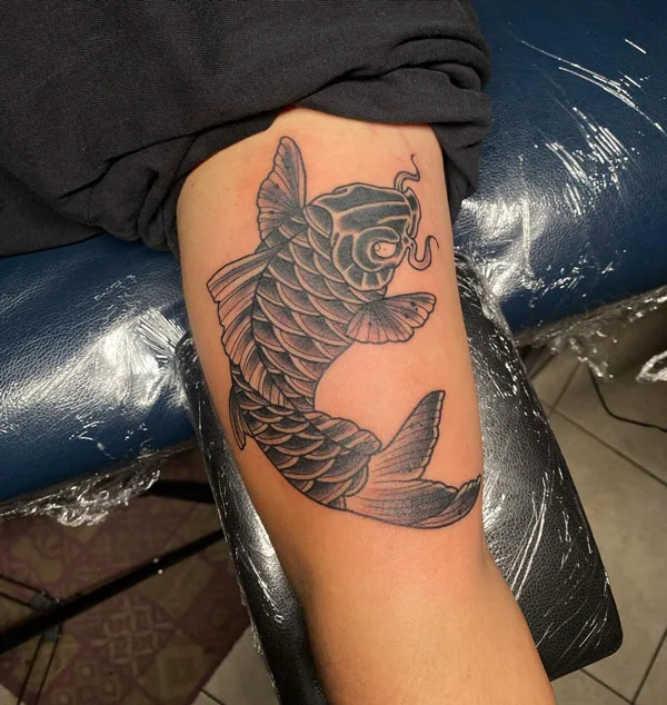 Black koi fish tattoo