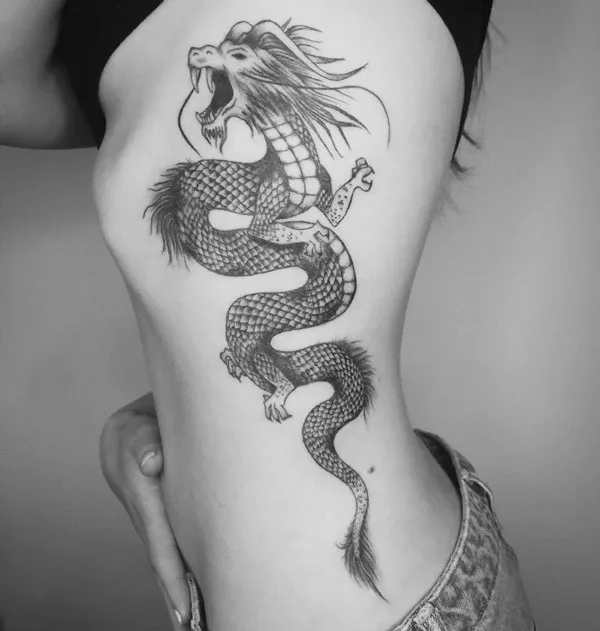 Chinese dragon tattoo on ribs