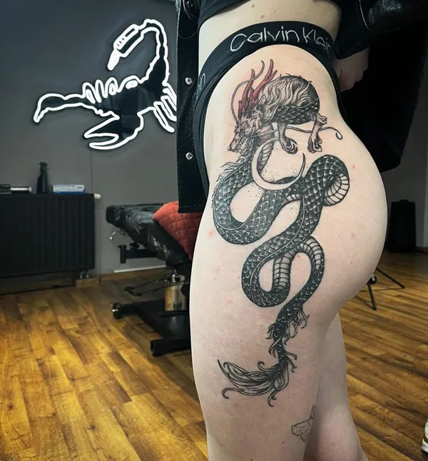 Chinese dragon tattoo on thigh 2