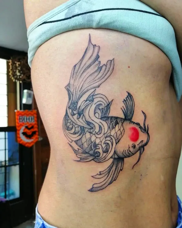 Koi fish rib tattoo