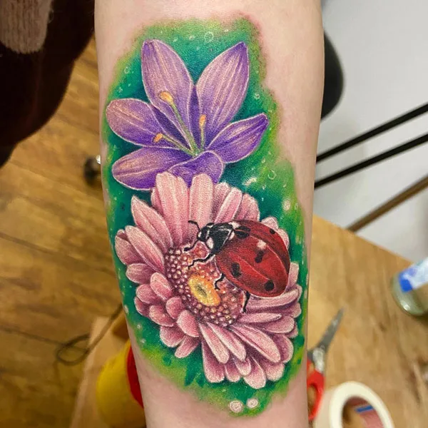 Ladybug on Flower Tattoo