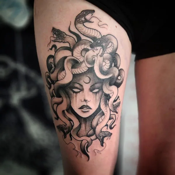 Medusa thigh tattoo